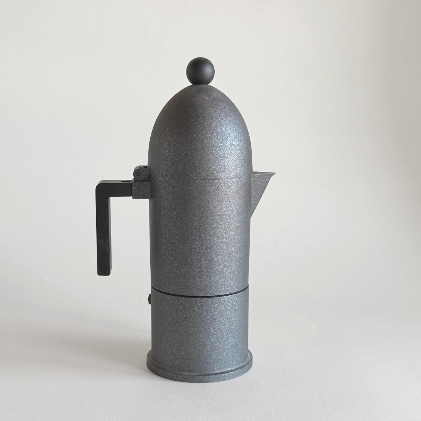 Alessi La Cupola 6-cup stovetop espresso maker in anthracite grey aluminium, designed by Aldo Rossi 1988