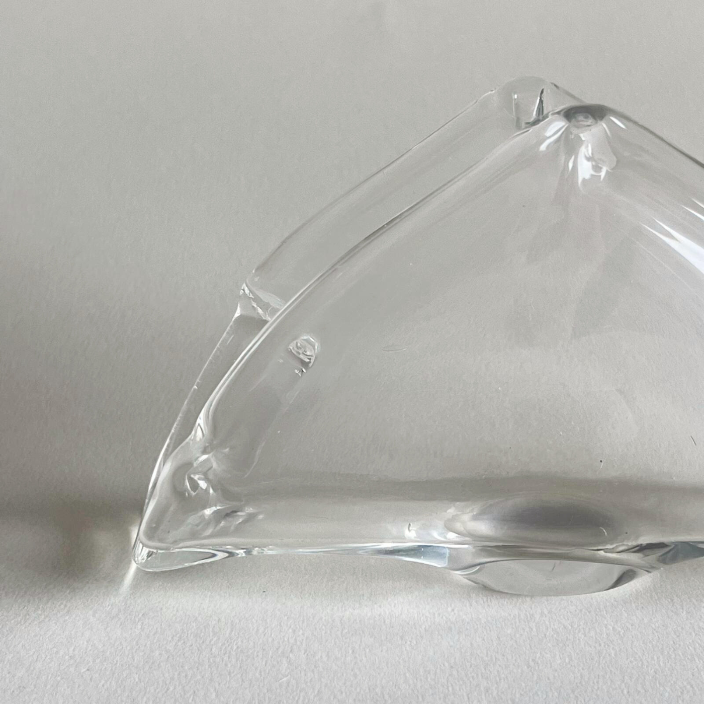 Sophisticated table setting featuring a glass napkin holder