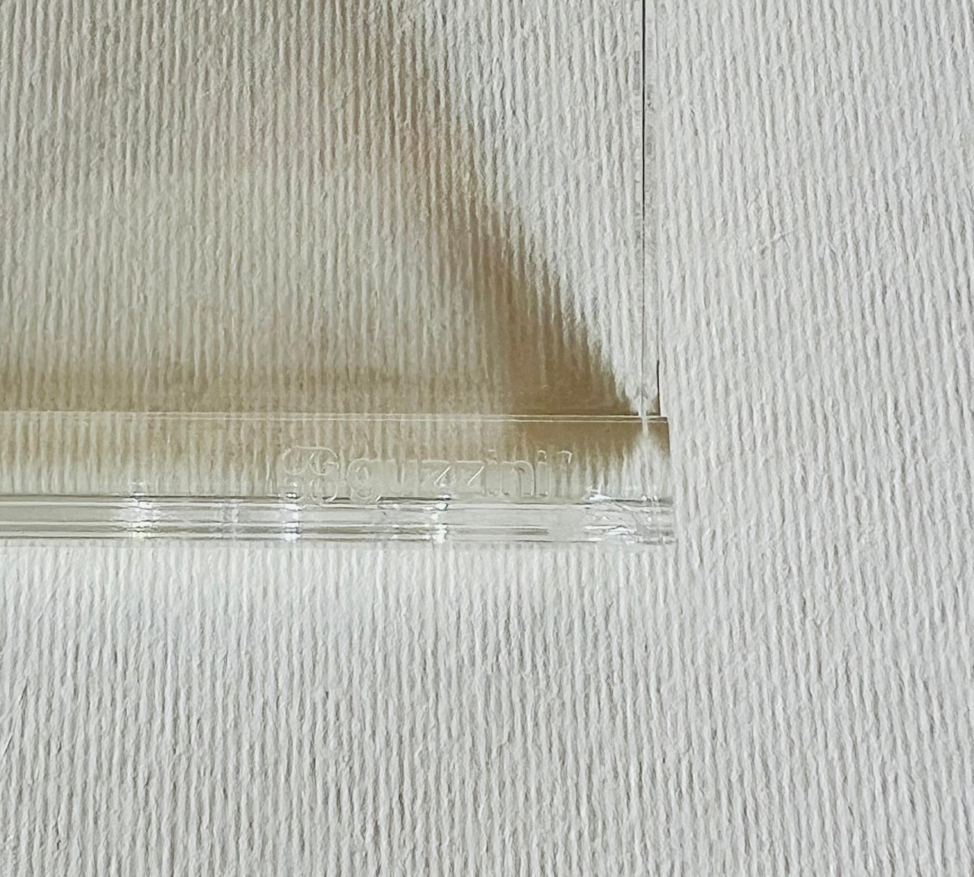 Clear lucite desk accessory close-up