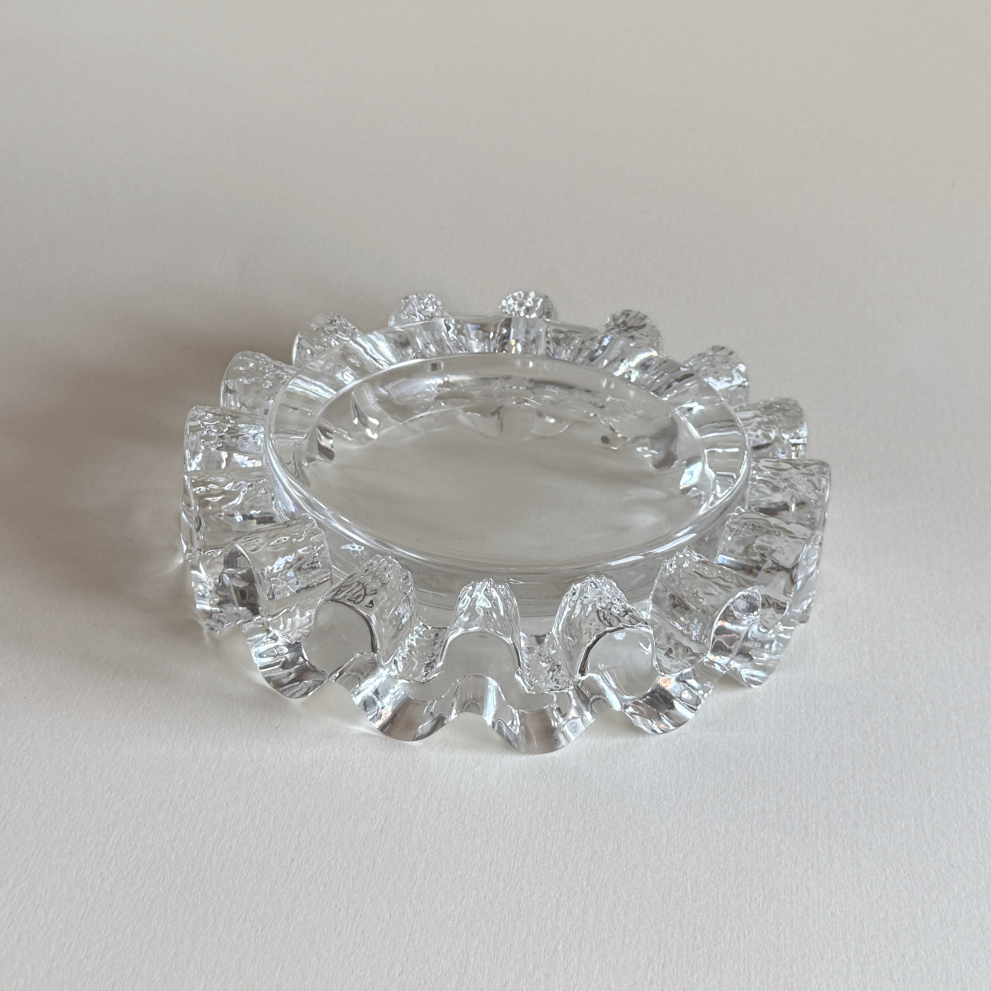 Heavy clear glass ashtray and catch-all, wave detail, 1980s Italian