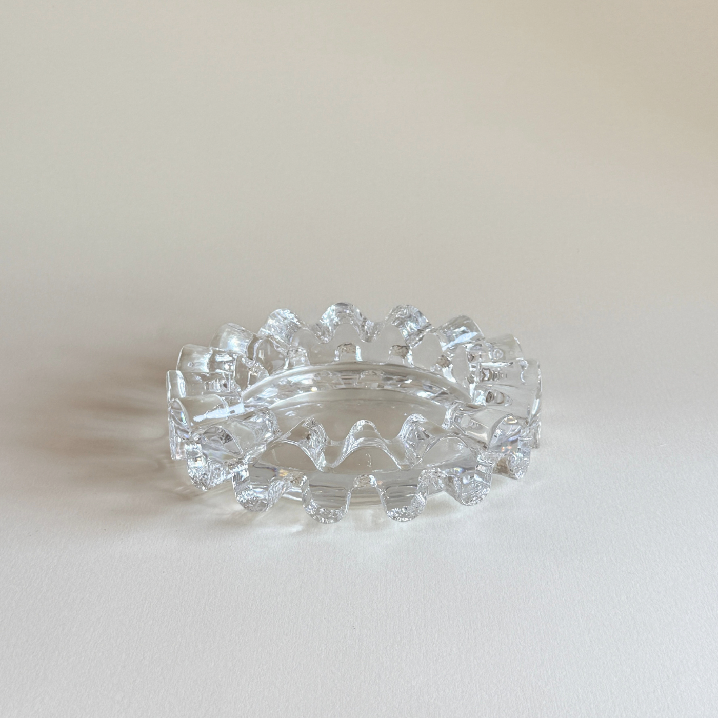 Heavy clear glass ashtray and catch-all, wave detail, 1980s Italian
