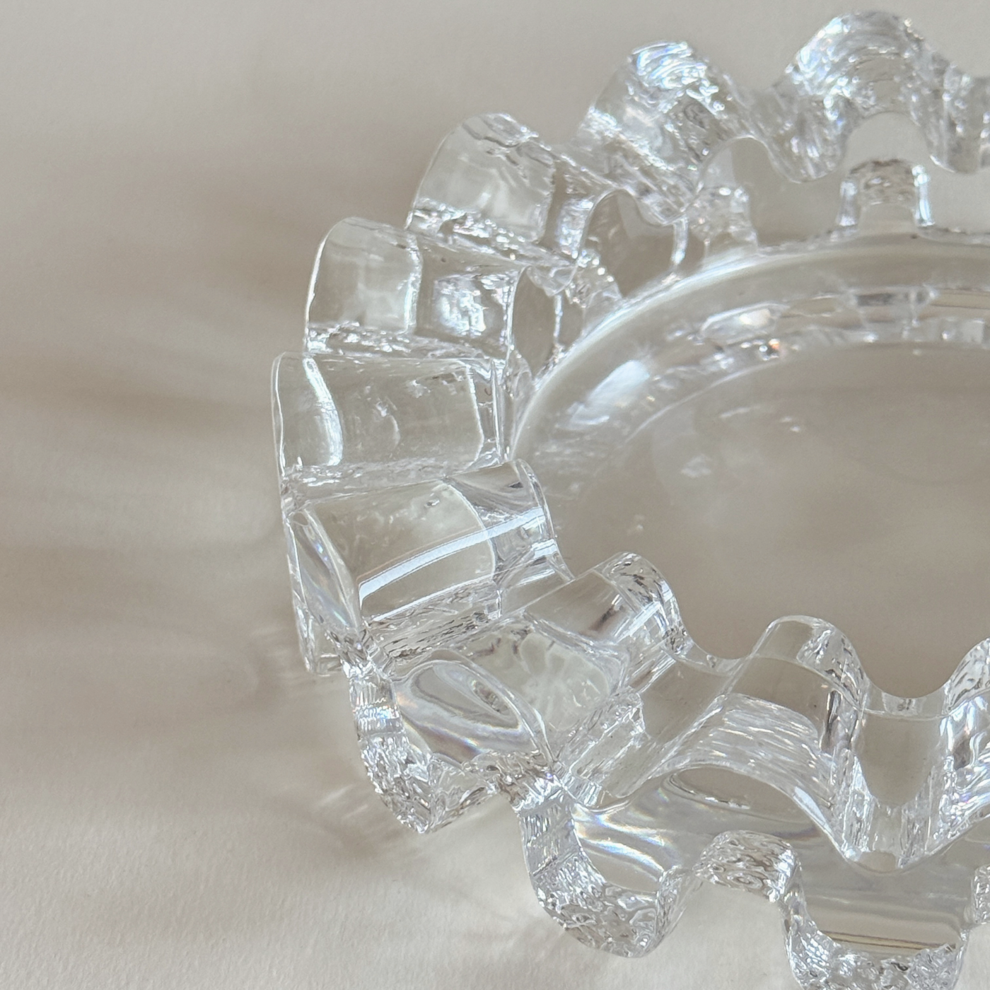 Heavy clear glass ashtray and catch-all, wave detail, 1980s Italian