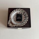 Close-up of vintage Italian silver serving dish