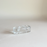 Clear glass Iittala candle holder from above, two circular openings for taper dinner candles