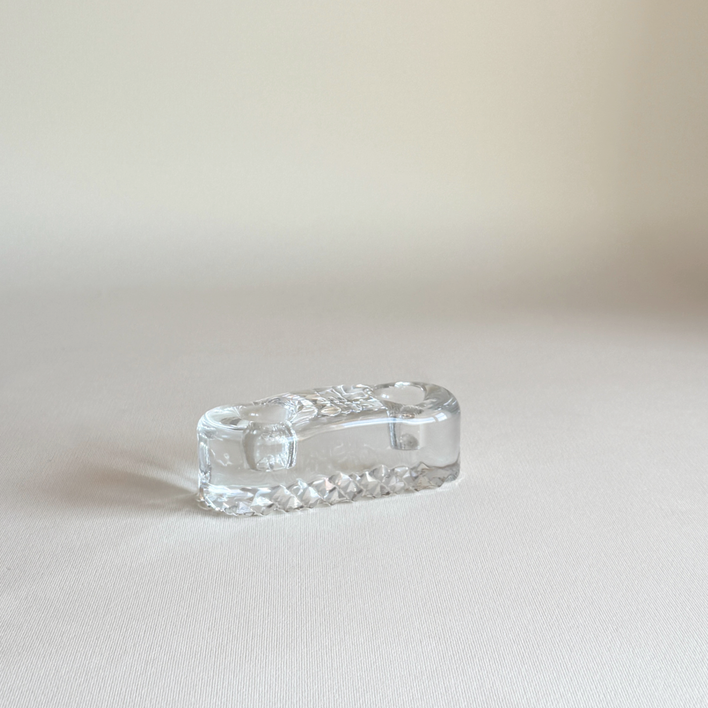 Clear glass Iittala candle holder from above, two circular openings for taper dinner candles