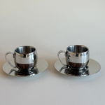Double-walled mirrored steel espresso cup close-up