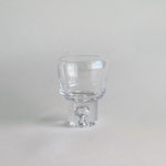 Close-up of artisanal glass variations in bubble stem