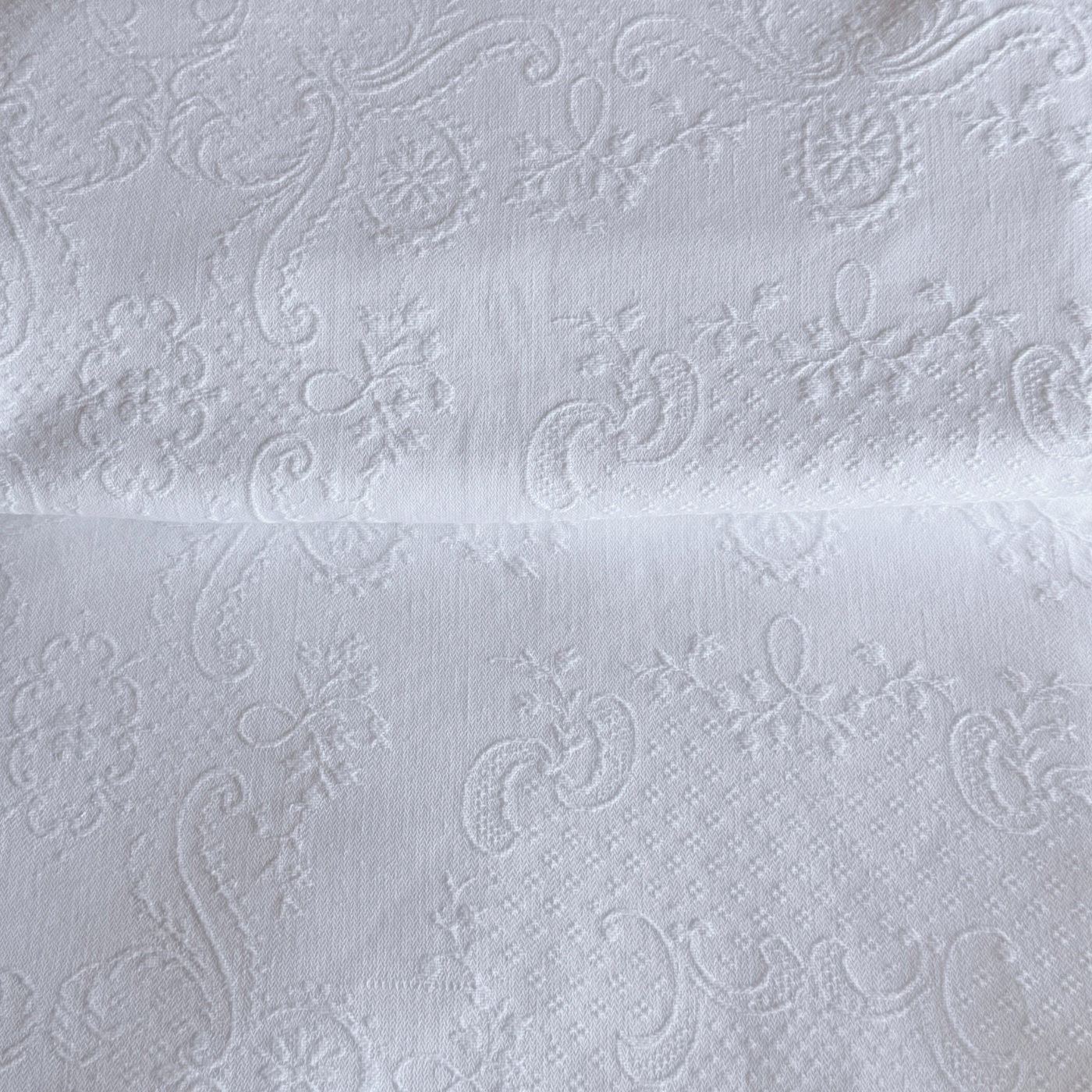 1970s Italian cotton jacquard bedspread with trim edge on bed