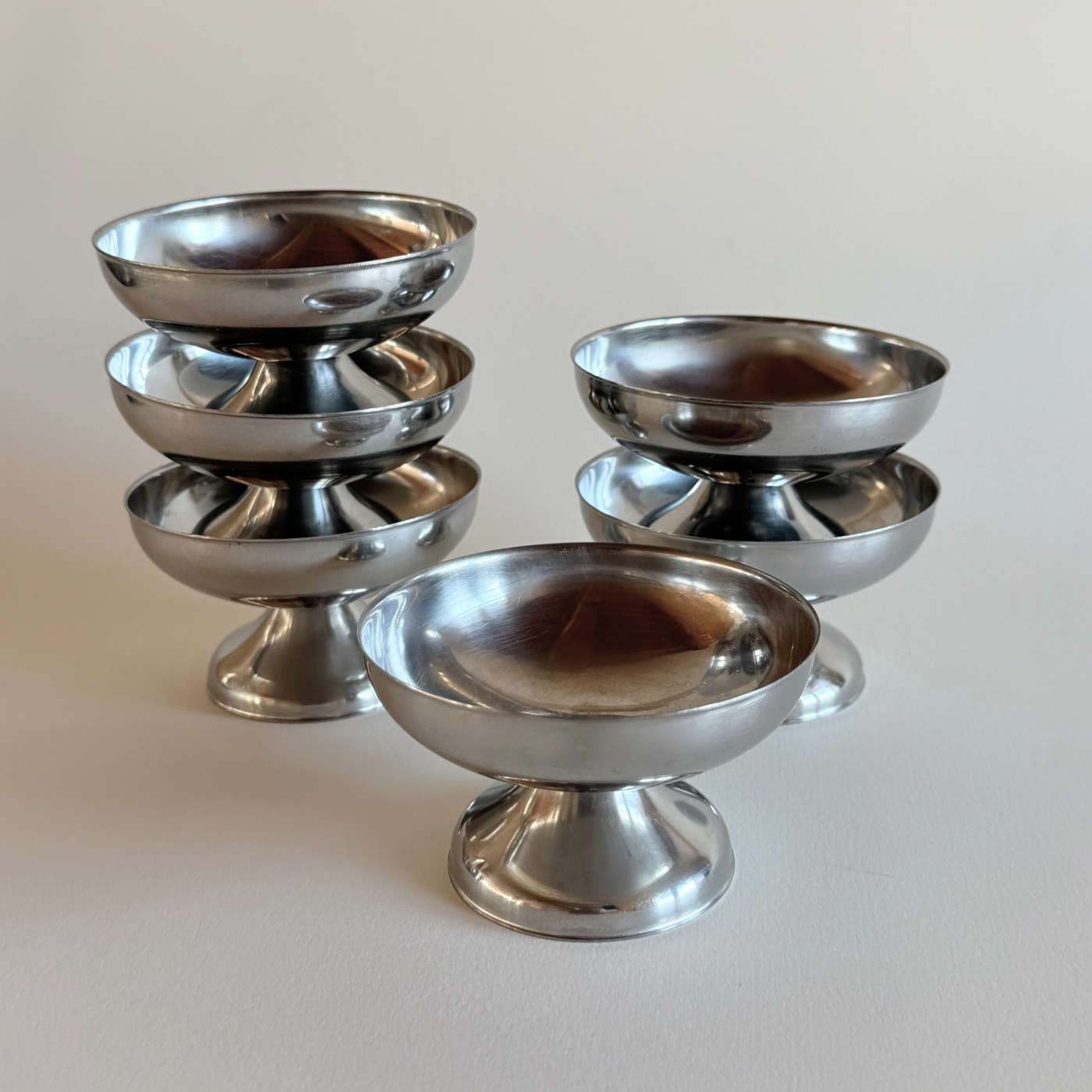 Set of six brushed metal ice cream cups