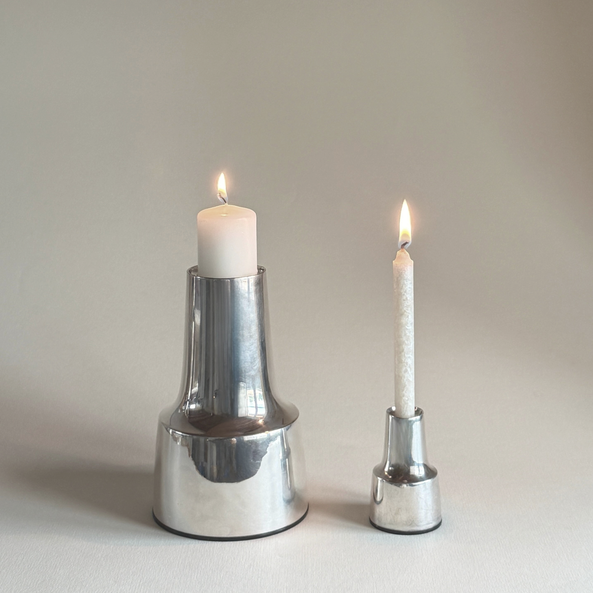 Cohr silver-plated candle holder, slender column on a wide round base, Danish modernist, Denmark 1960s