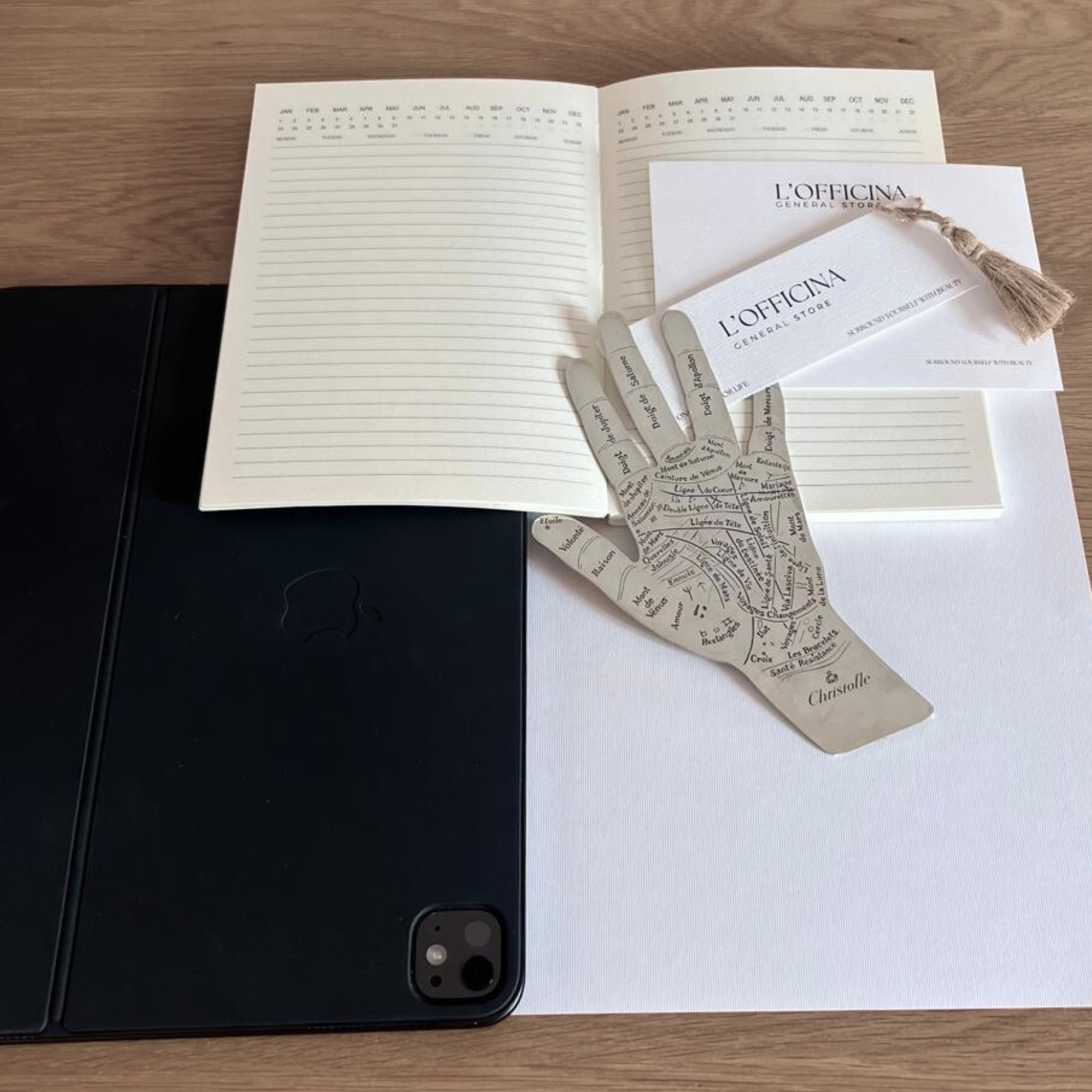 Christofle hand of destiny  paper weight on desk