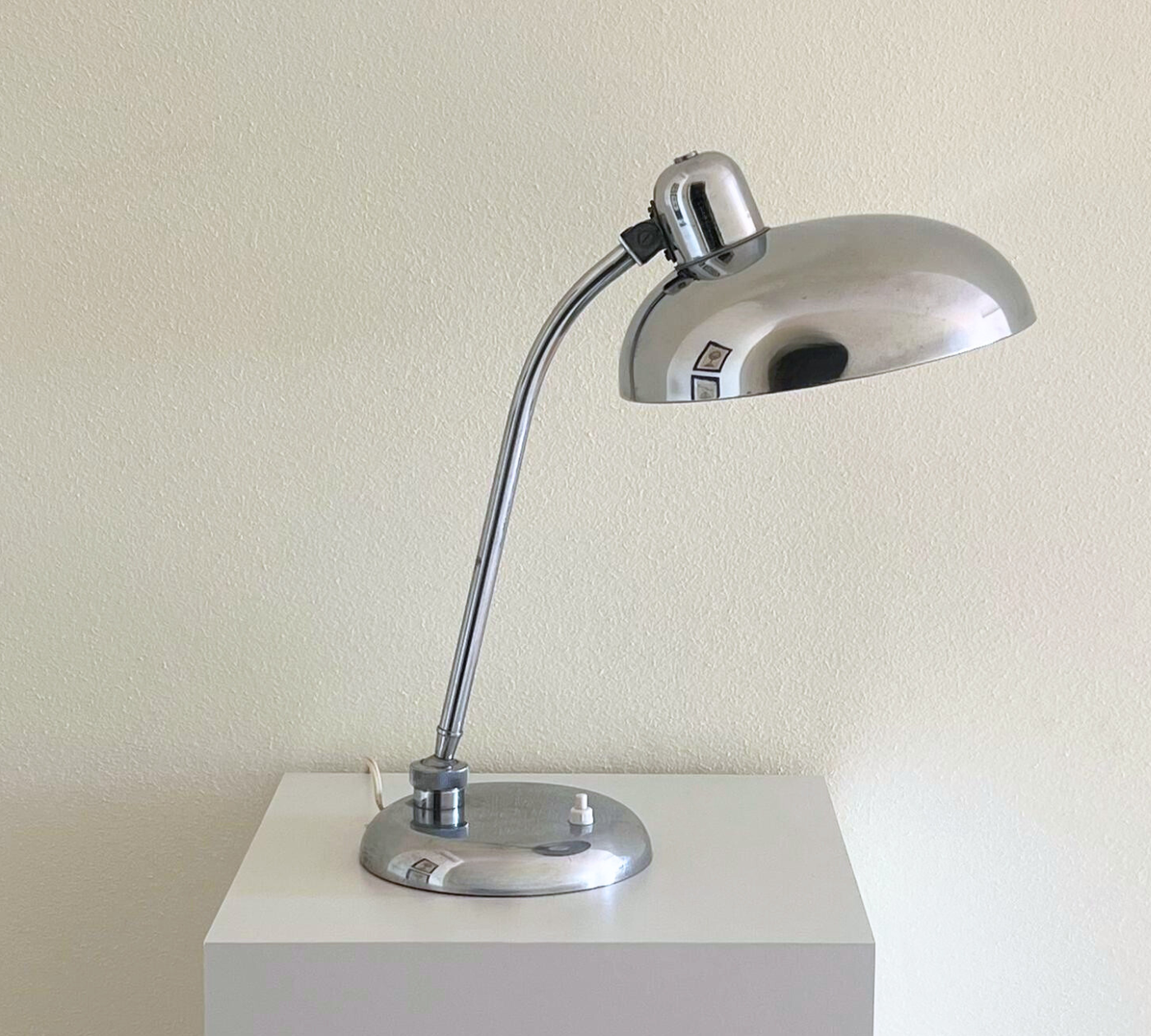 Vintage chrome lamp with reflective base