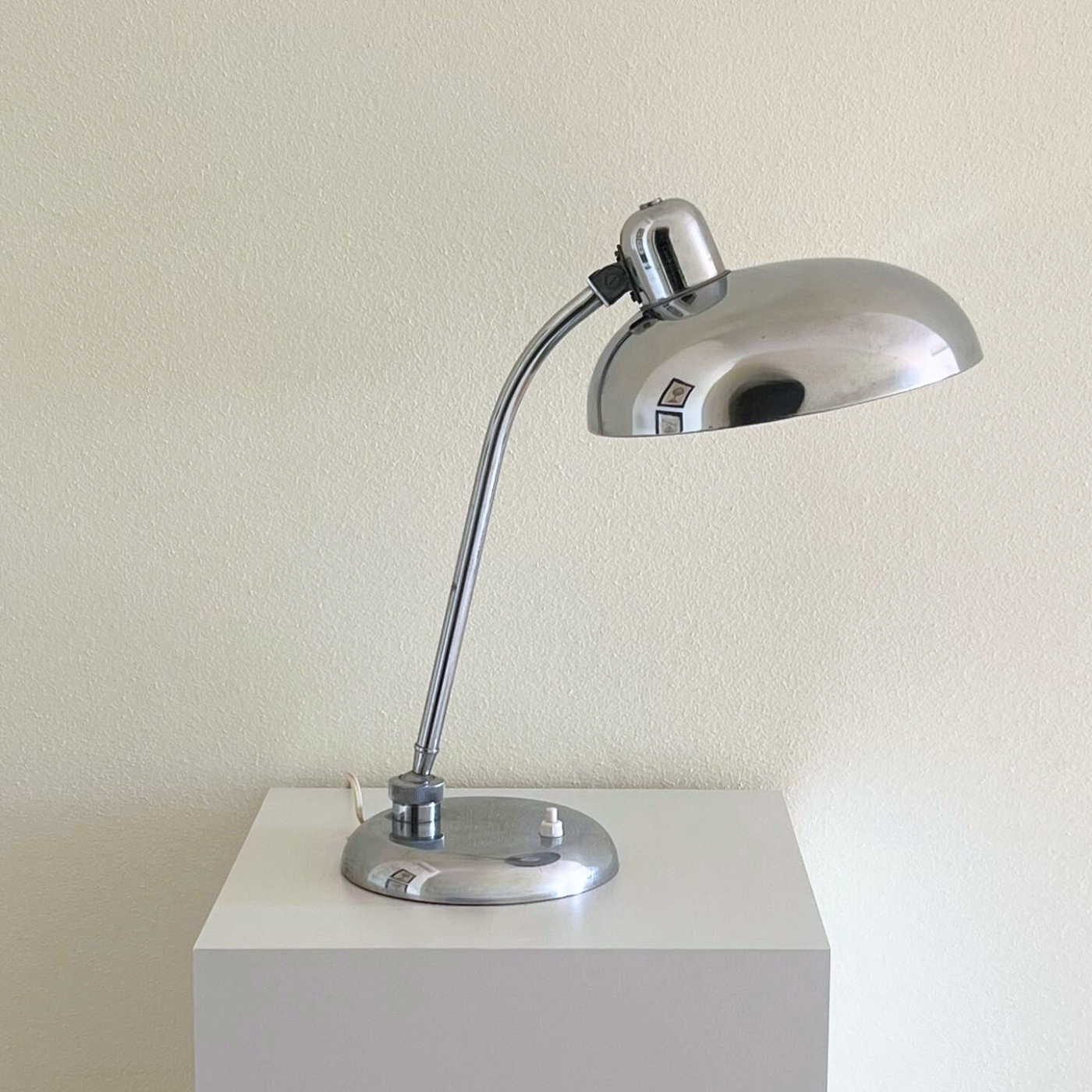 Vintage chrome lamp with reflective base