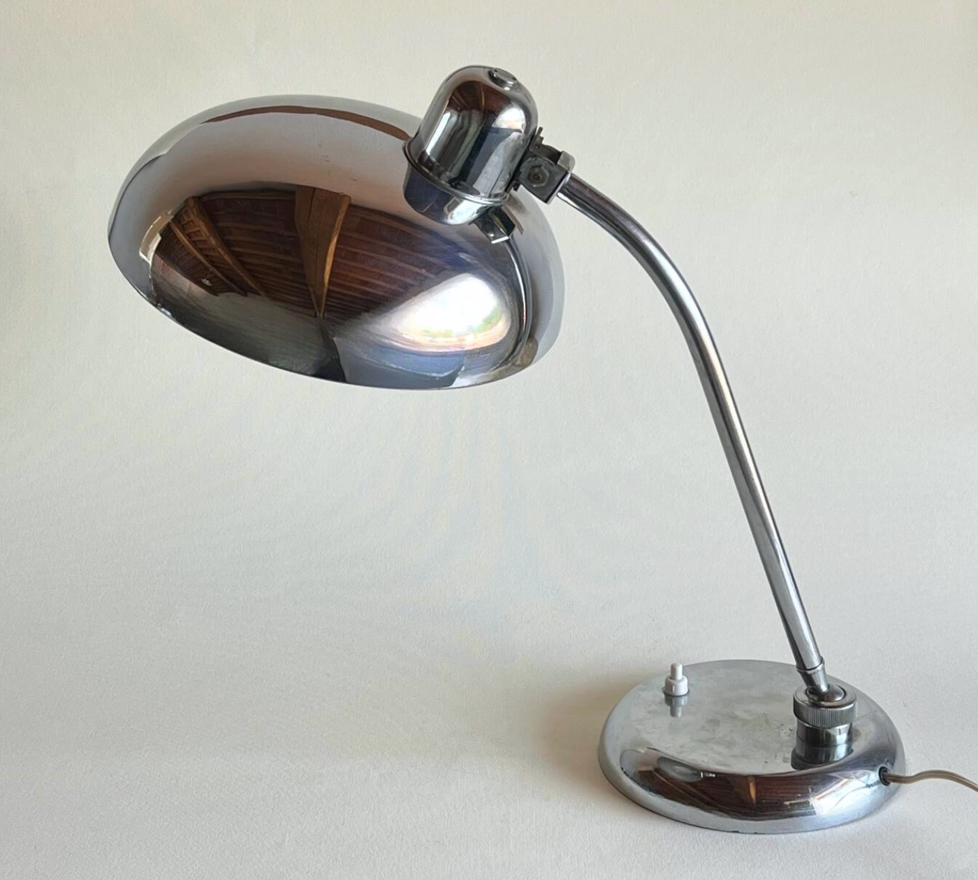 Vintage chrome lamp with reflective base
