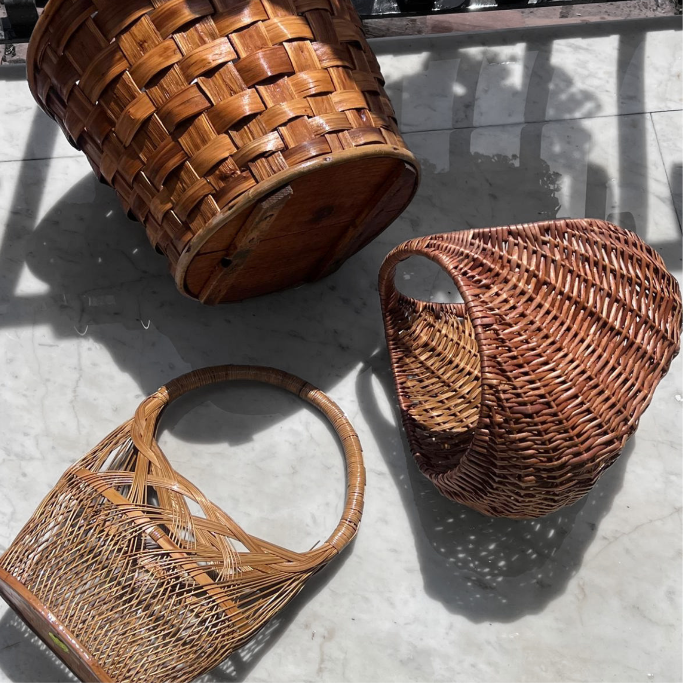 1970s Italian rattan crescent moon basket with dark close weave