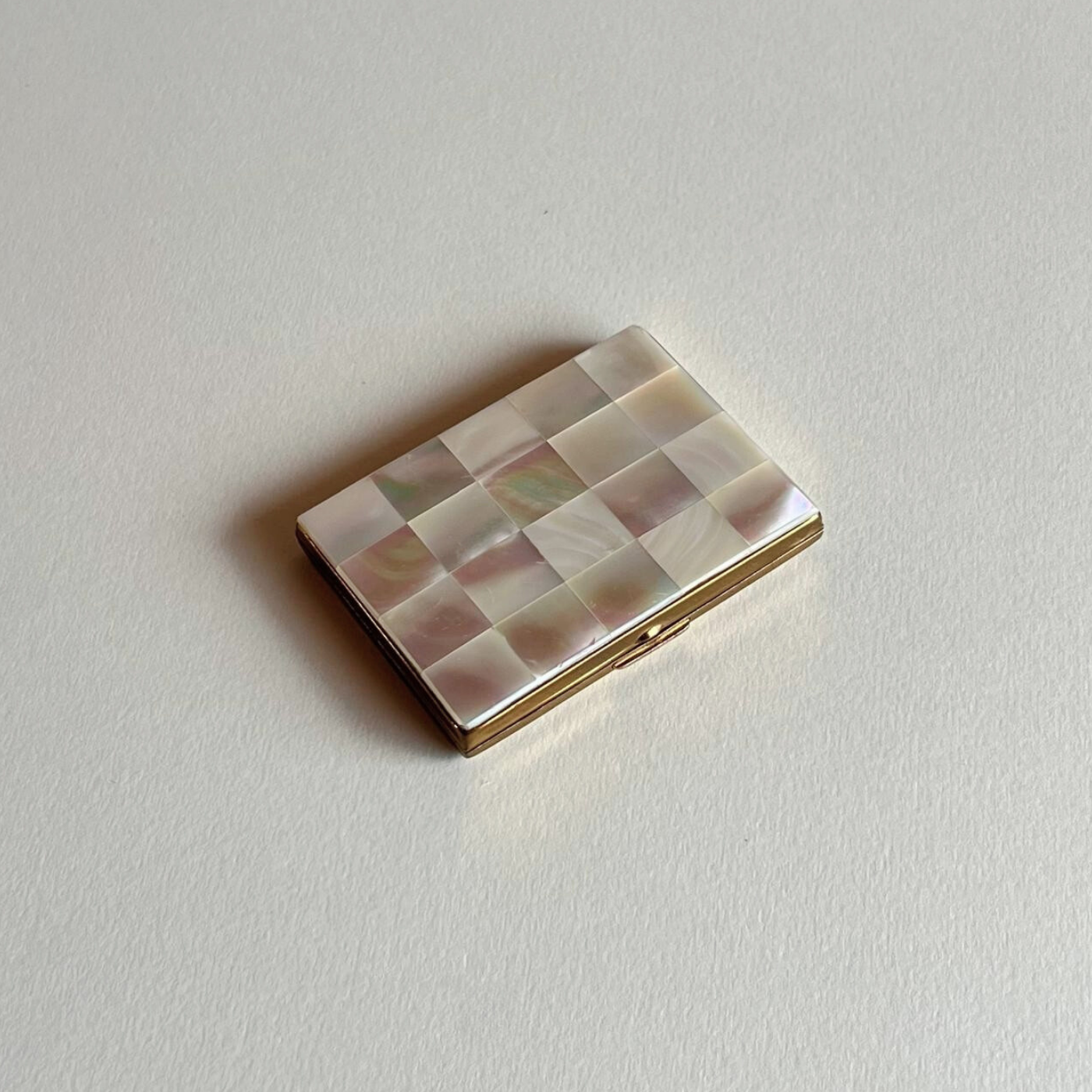 Compact travel pill case mother of pearl