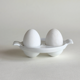 white ceramic double egg cup