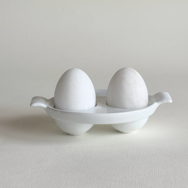 white ceramic double egg cup