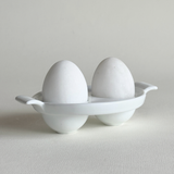 white ceramic double egg cup
