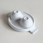 white ceramic double egg cup