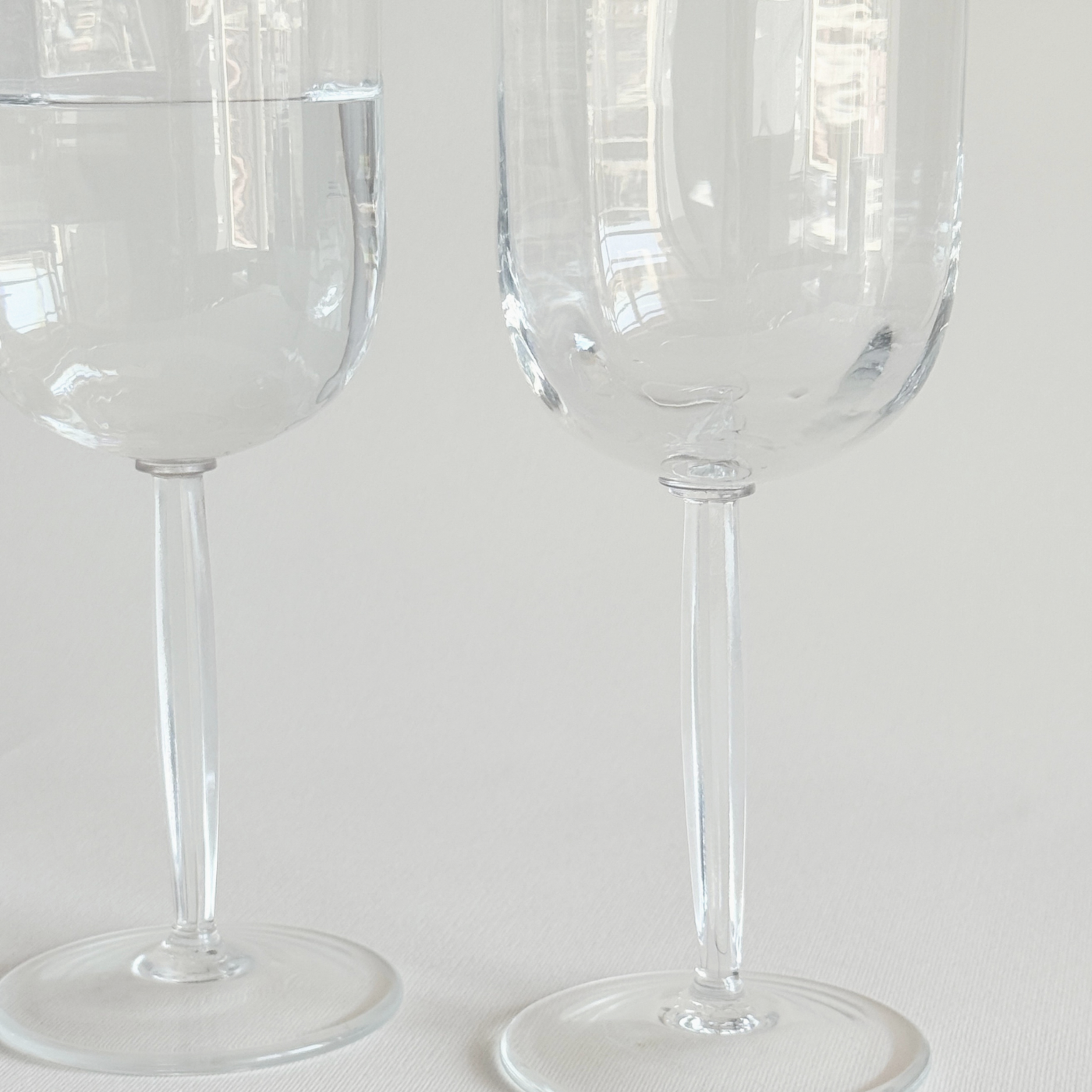 Italian ribbed red wine glasses — base view showing foot and overall condition, minor surface marks