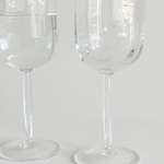 Italian ribbed red wine glasses — base view showing foot and overall condition, minor surface marks