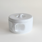 White ceramic tureen — side view showing profile and ladle notch in rim detail