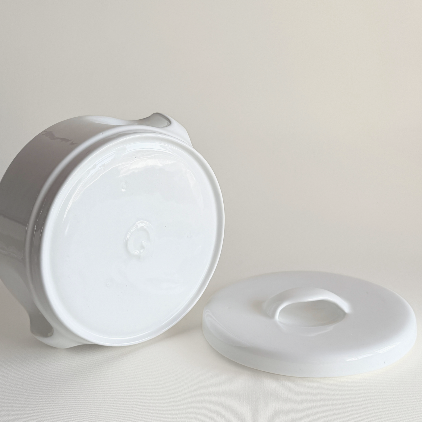 White ceramic tureen — base view showing underside and overall condition