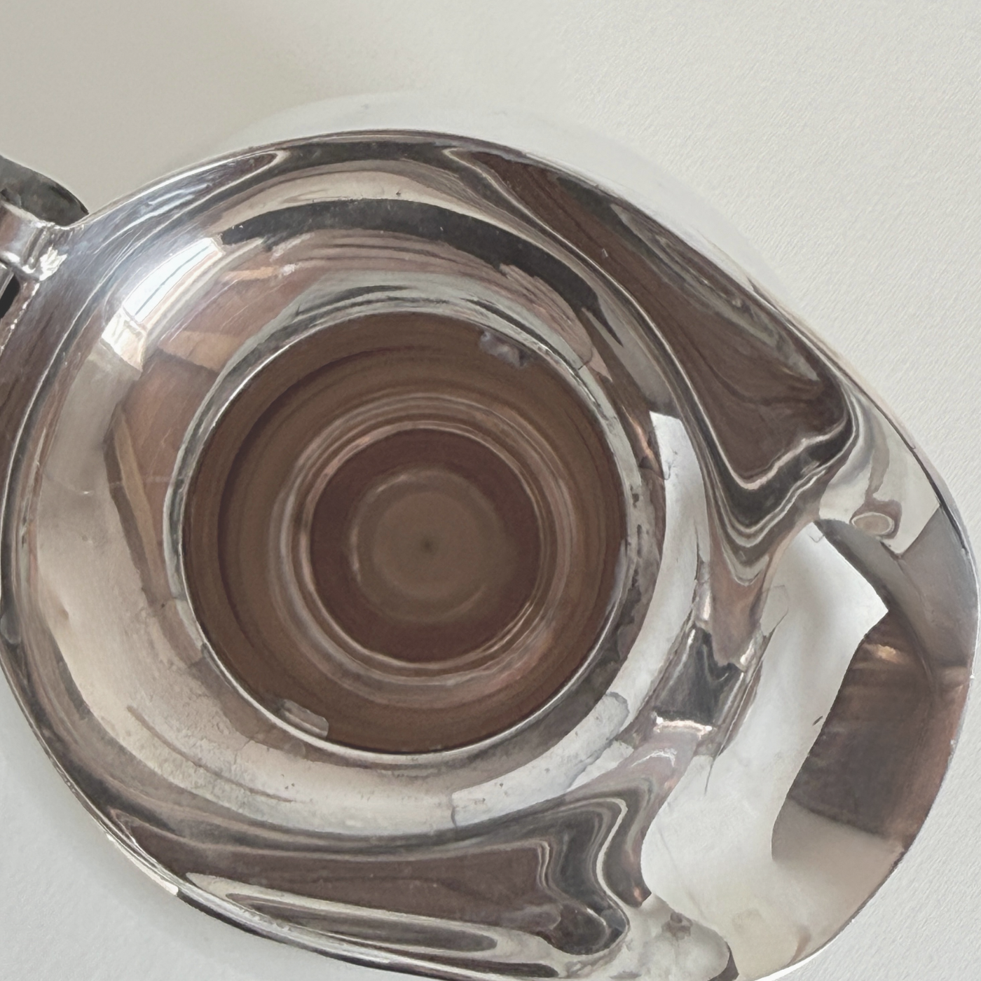 Silver plated thermos jug — rear view showing circular handle and stepped base ring, approx. 1.2 kg