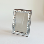 Silver plated hammered photo frame in silver and brown wood, holds 13 x 9 cm photograph