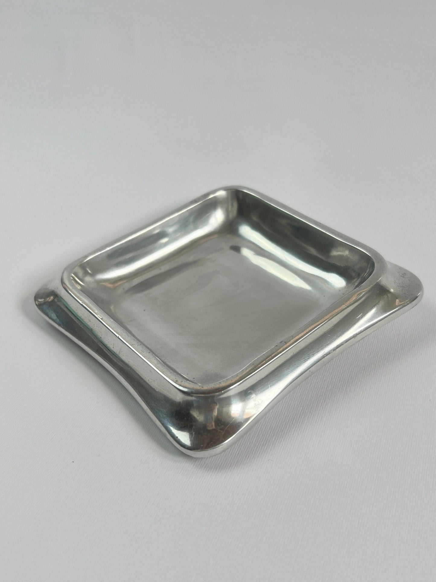 Square stainless steel tray close up