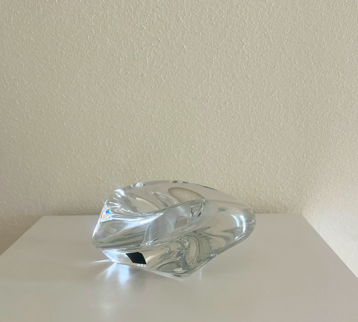 Elegant crystal ashtray reflecting natural light