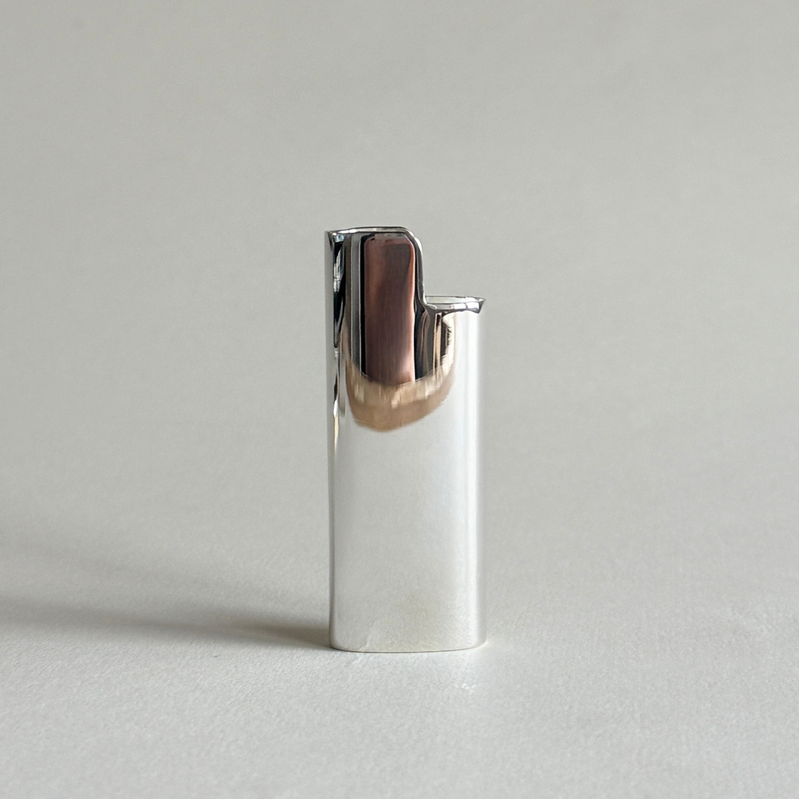 Sterling silver Maxi Bic lighter case in polished mirror silver — handmade in Lucca by L'Officina
