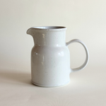 White stoneware pentik jug with brown splatter pattern kitchen ware