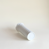 L'Officina Pre-Loved white porcelain vase with swirl detail, 23 cm, for stems on a shelf or table