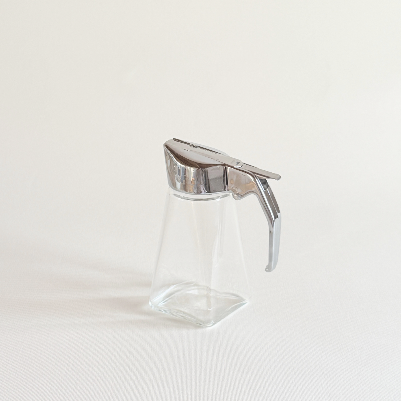UWO sugar dispenser, square glass body with stainless pour mechanism
