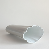 White ceramic vase — base view showing underside and overall condition