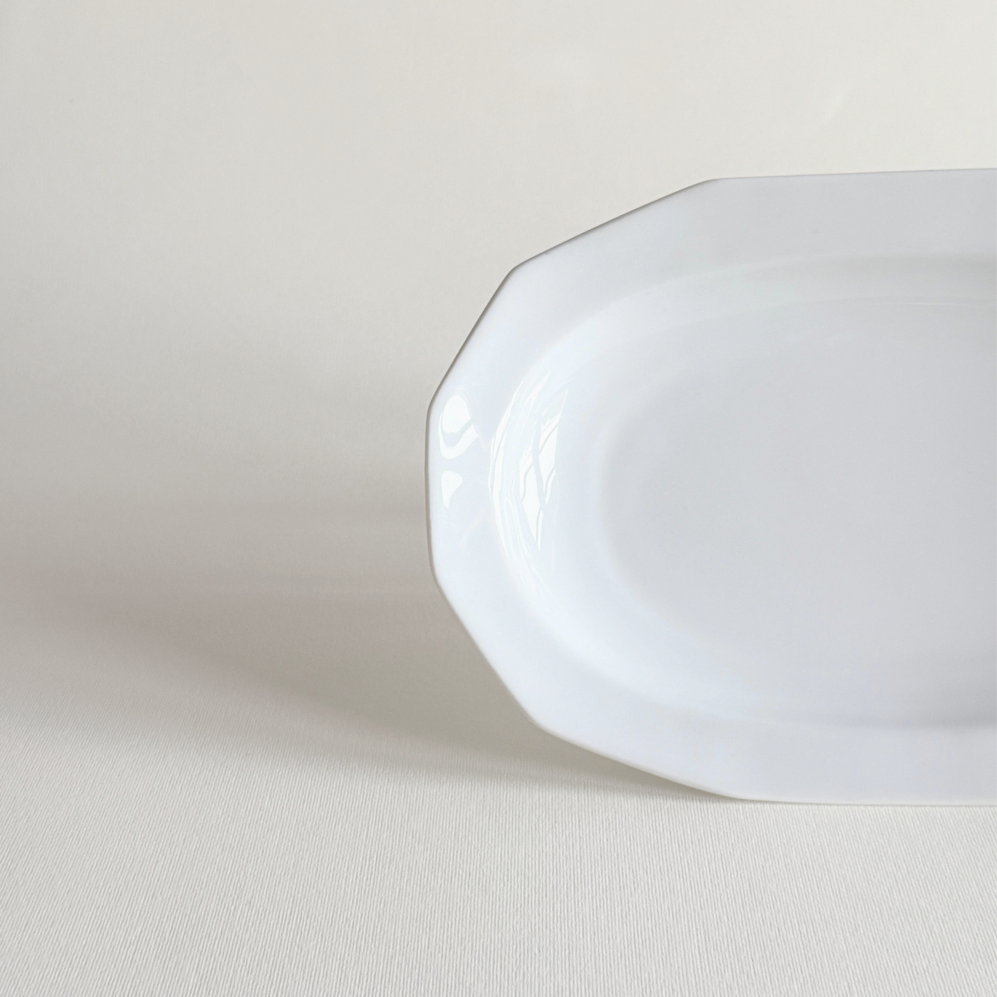 Rectangular porcelain plate viewed from above, clean white surface