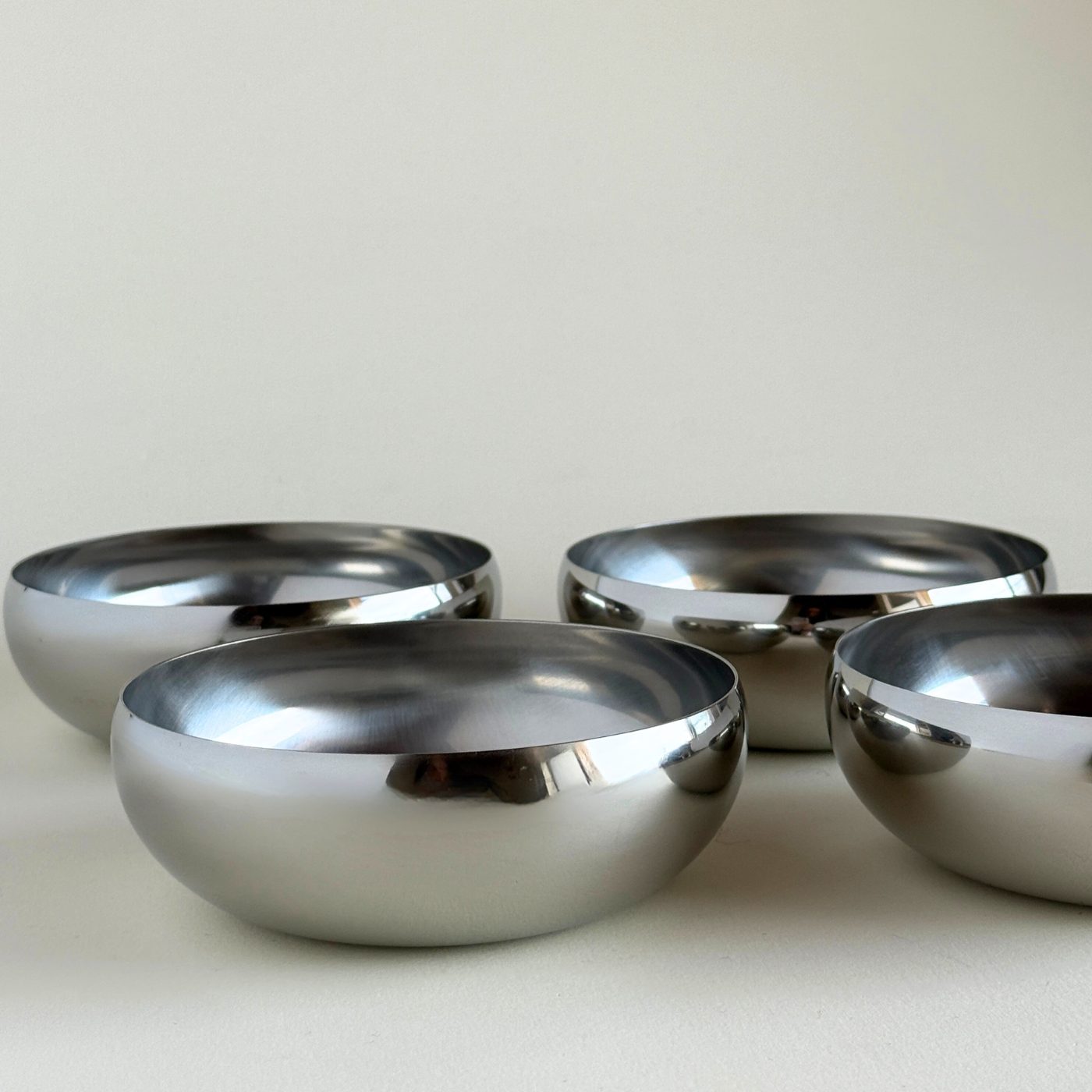 AMC polished Metal Bowls  Large stainless steel set of four close up