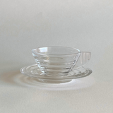 Elegant vintage Arcopal espresso cup and saucer profile view