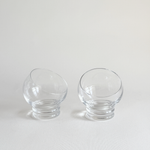 Italian Space Age ball cocktail glasses — set of 2, front view showing spherical bowl form, clear glass, 1970s Italian design