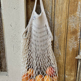 Short-handled ecru cotton net bag by Filt 1860, knitted cotton mesh tote made in Normandy