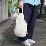 Filt 1860 ecru net bag in undyed cotton mesh shown flat, zero waste French shopping tote