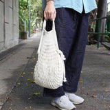Filt 1860 ecru net bag in undyed cotton mesh shown flat, zero waste French shopping tote