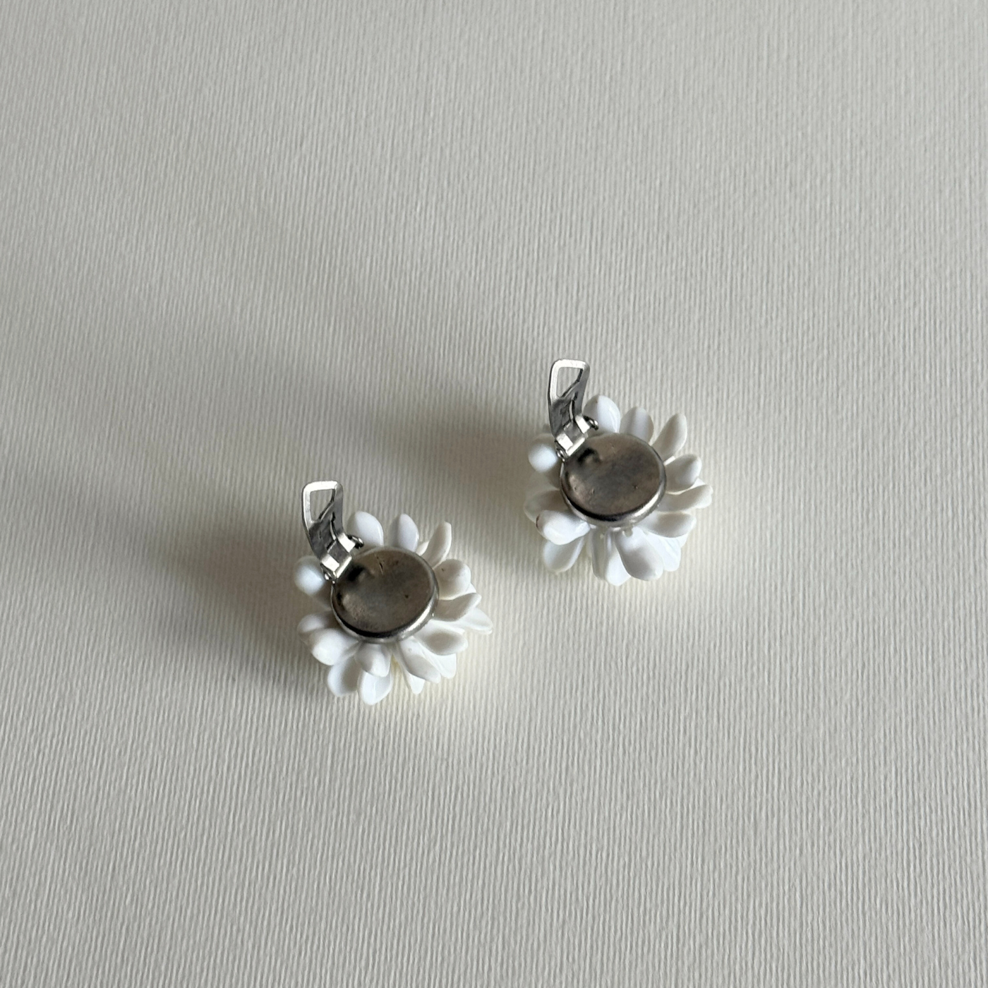 White floral clip earrings for day and evening wear