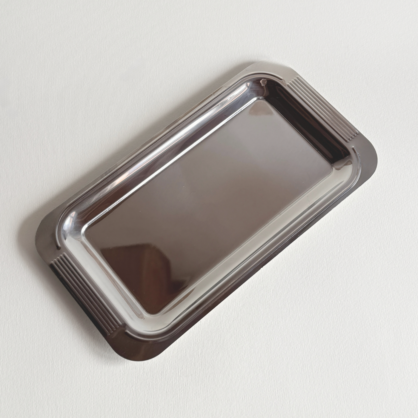 Guy Degrenne mirrored tray 28x15 cm polished stainless steel with ribbed handles