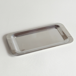 Guy Degrenne mirrored tray with ribbed handles and polished stainless steel finish, 28x15 cm