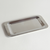 Guy Degrenne mirrored tray with ribbed handles and polished stainless steel finish, 28x15 cm