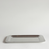 Guy Degrenne mirrored tray 28x15 cm with ribbed handles and polished stainless steel surface