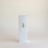 Cereria Graziani Tapered Dinner Candles in an ivory wax set, shown in a tall white box with a teardrop window.